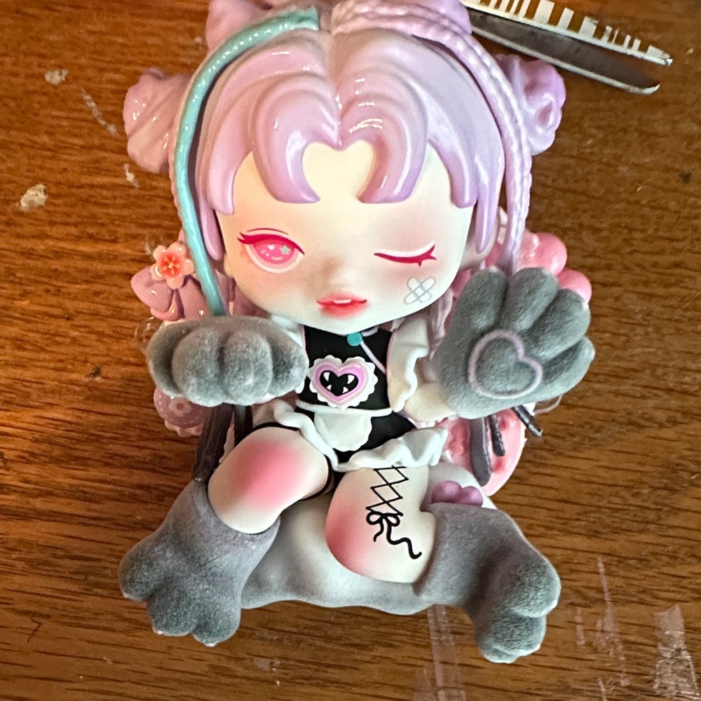 Cute Pink and Gray Figurine